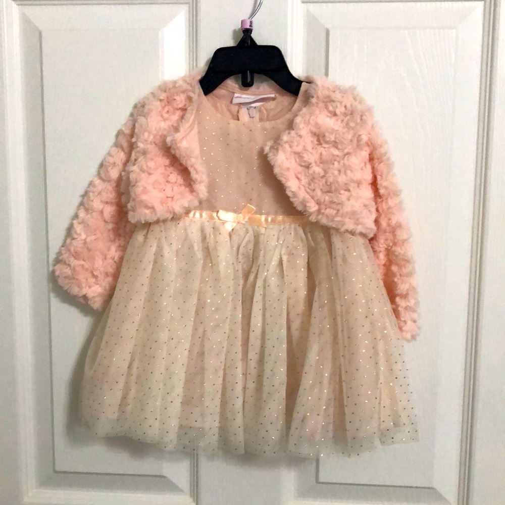 Beautiful baby dress never got a chance to be worn